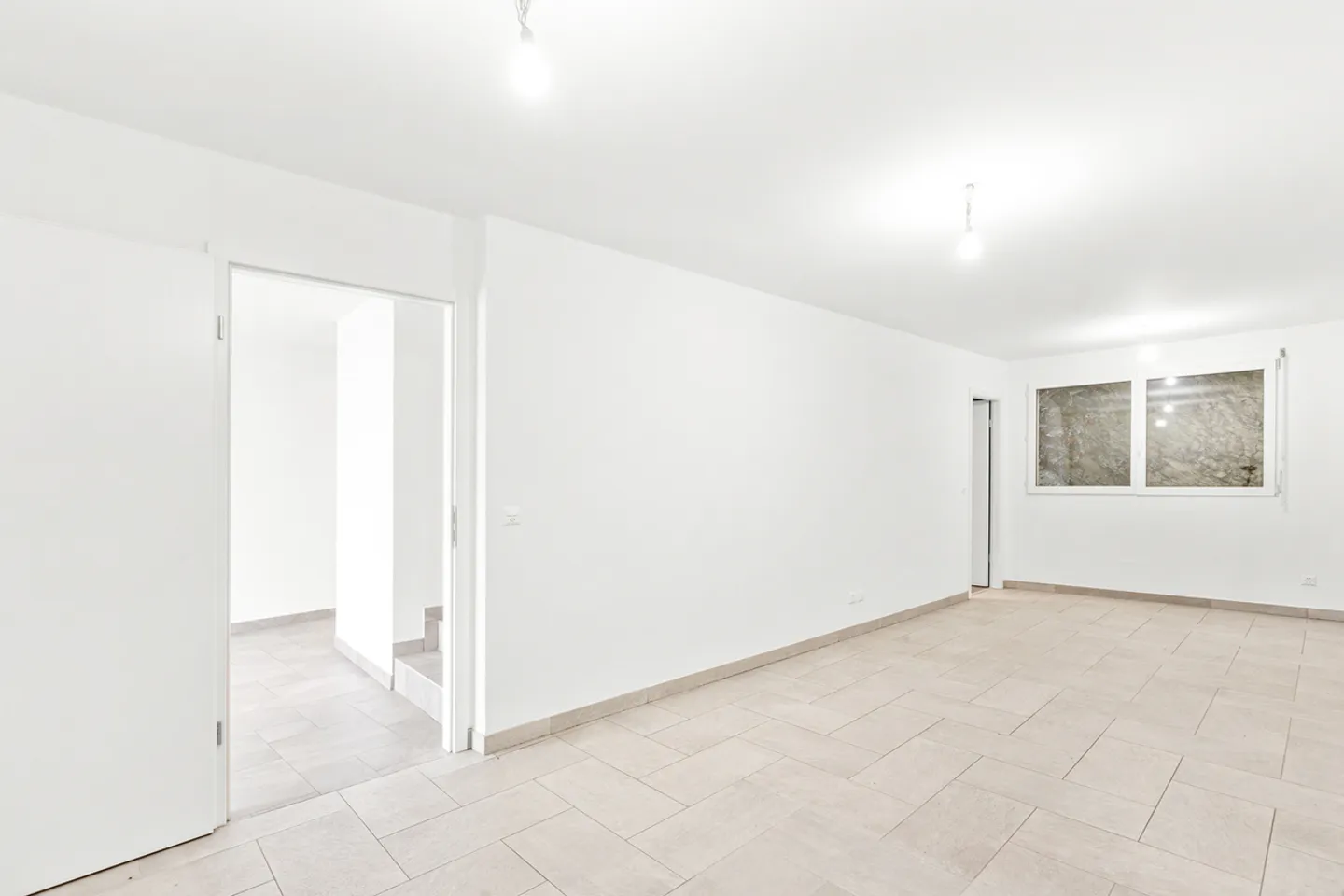 Contemporary duplex bathed in light with stunning lake view! - Photo 8 of 10