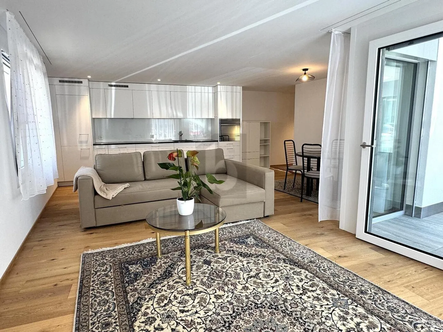 STYLISH WITH PARTIAL FURNISHING - Photo 1 of 6