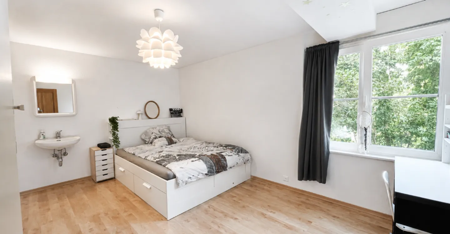 Einzelhaus mit großzügigen Volumen in einer grünen Umgebung - Foto 10 von 10