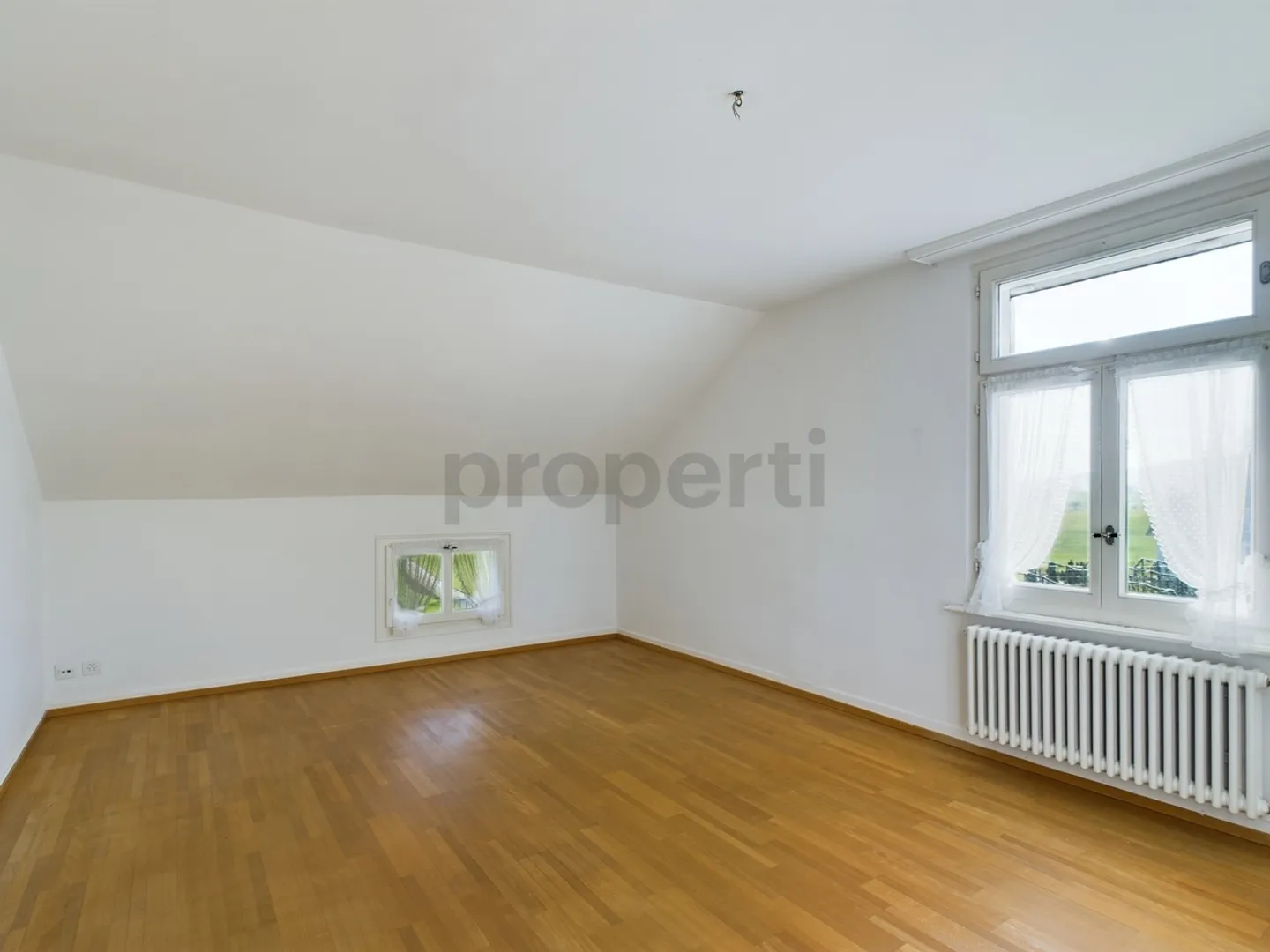 Gemütliche 4.5-Zimmer Wohnung in Lömmenschwil mit Seeblick - Foto 6 von 10