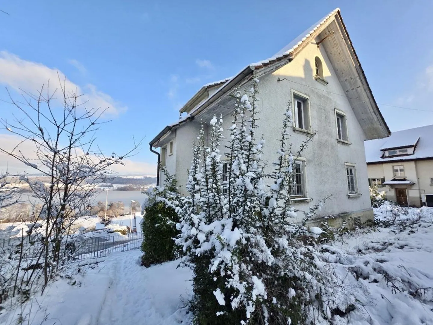 Haus mit Seesicht und Baulandreserve - Foto 1 von 17