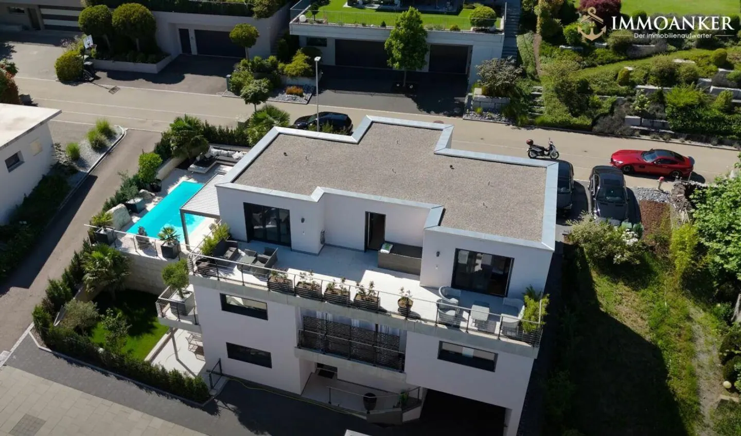 Luxuriöses Einfamilienhaus mit Einliegerwohnung und traumhaftem Gartenparadies in Neftenbach - Foto 14 von 16