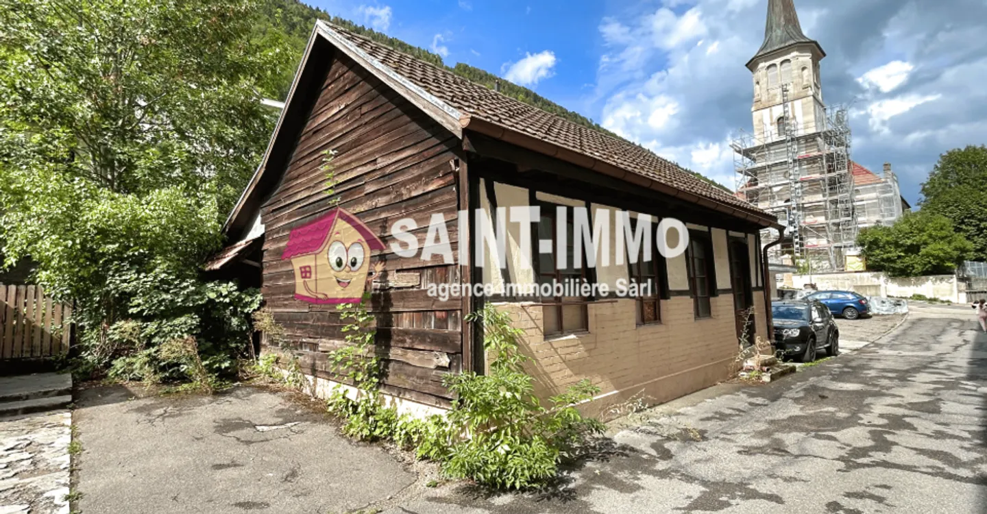 Rental building to be completely renovated with 3 apartments, a shed/annex, and a garden plot - Photo 2 of 7
