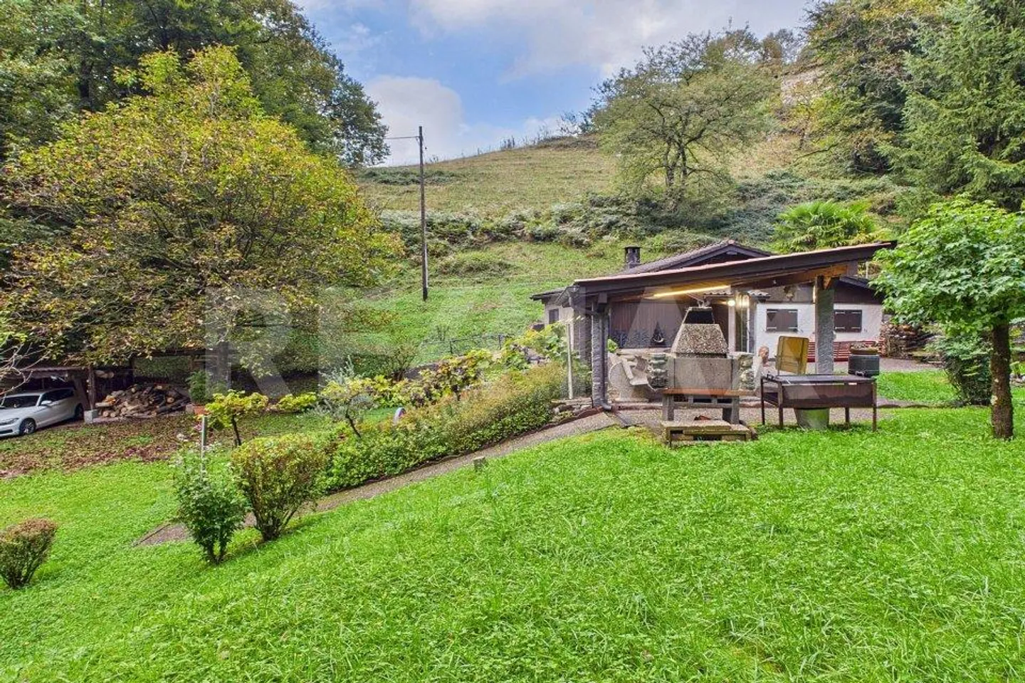 A Unique Ticino Jewel with Private Access – Nestled in Nature - Photo 5 of 13