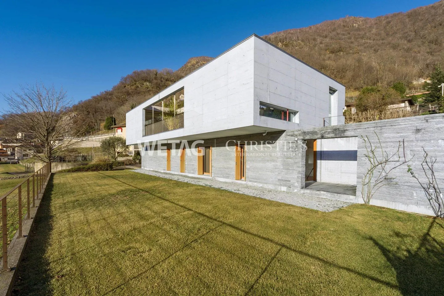 Modern villa with spacious terraces & garden for sale in Bironico - Photo 1 of 13