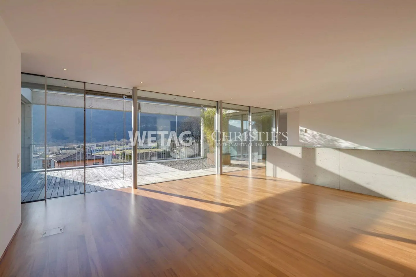 Modern villa with spacious terraces & garden for sale in Bironico - Photo 2 of 13