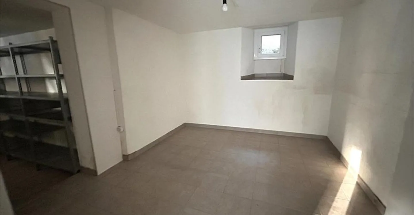 Edificio ad uso misto in affitto - Foto 1 di 13