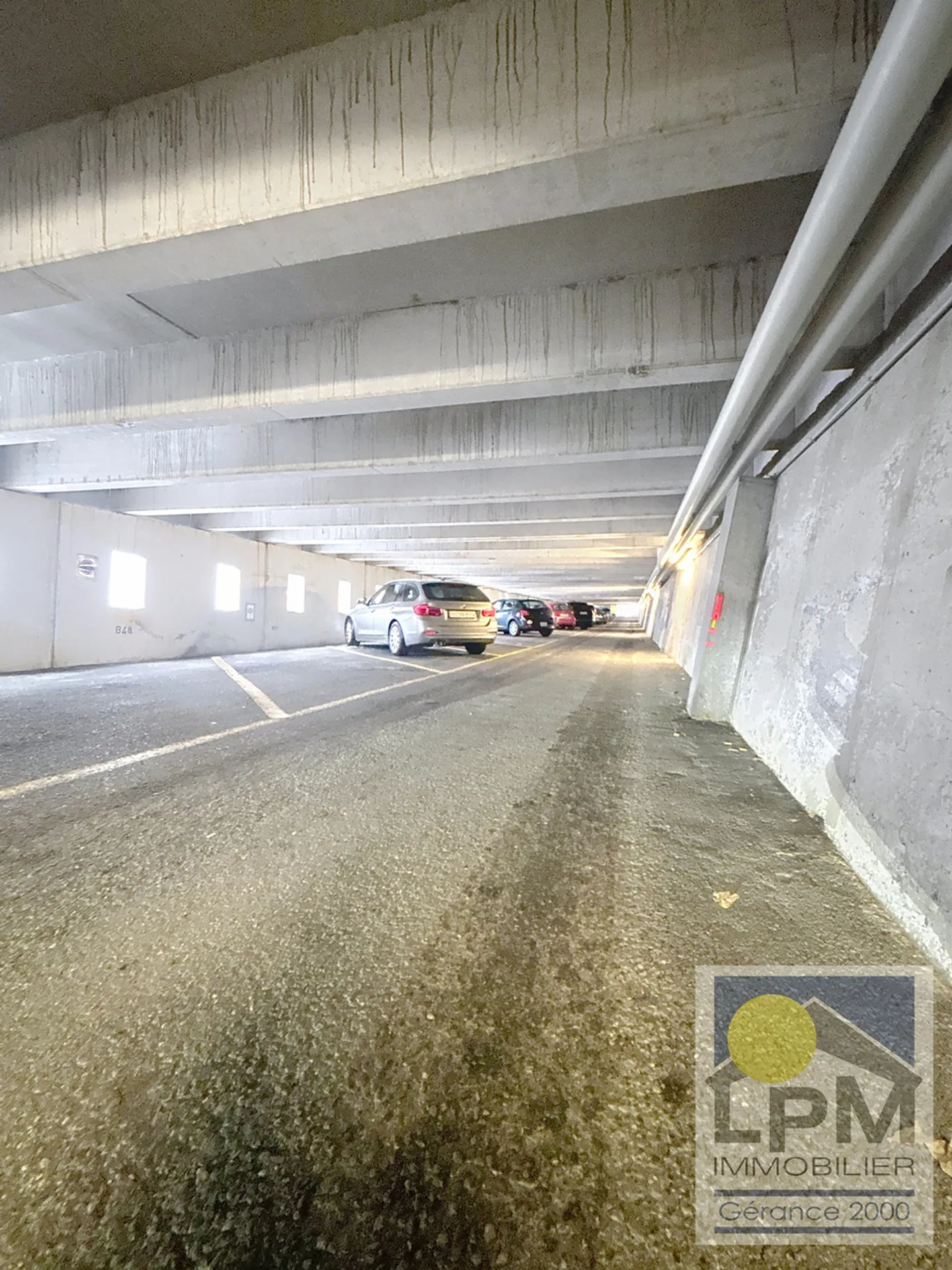 Place de parc couverte Alpha - Photo 1 sur 2