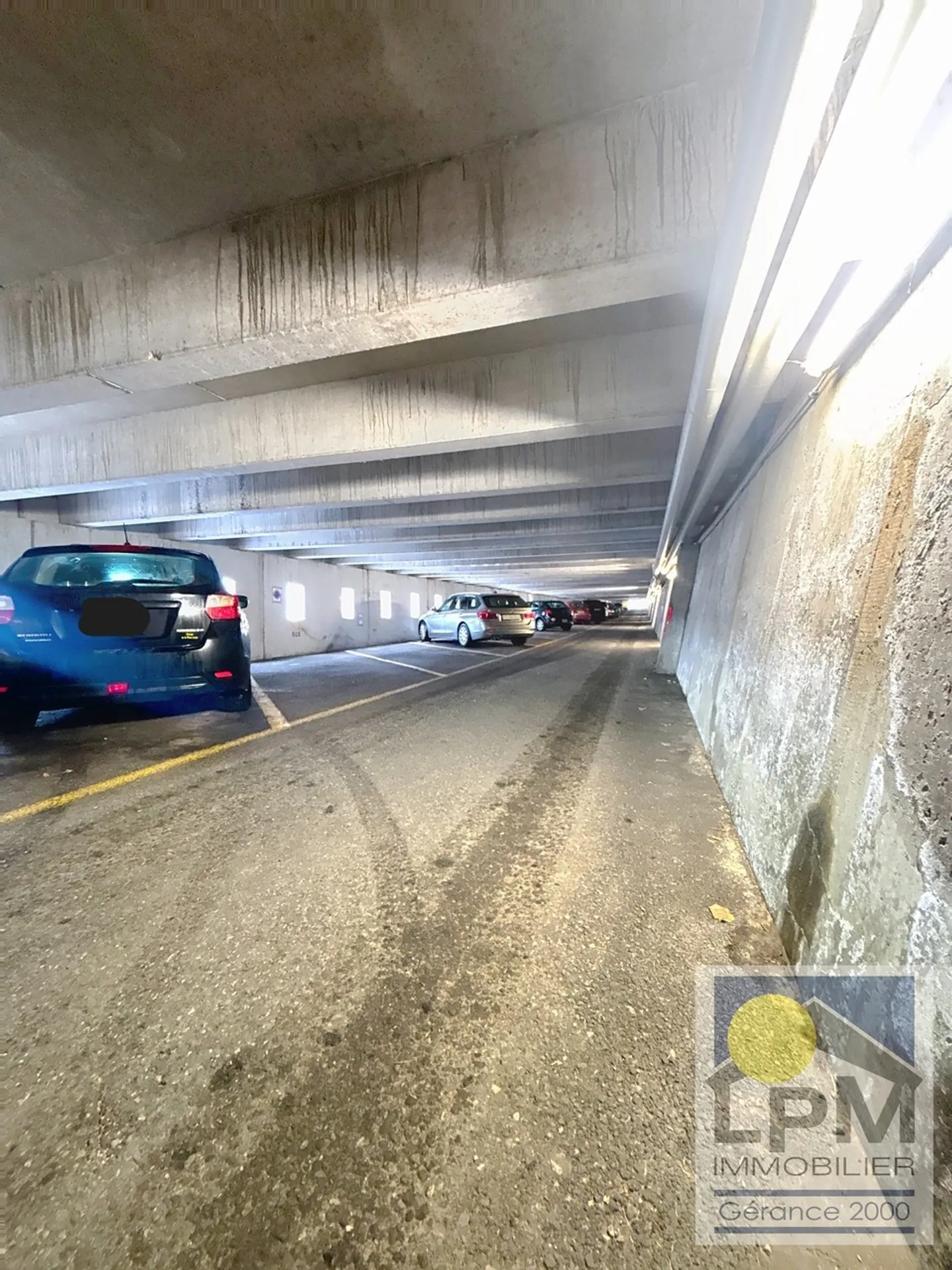 Place de parc couverte Alpha - Photo 2 sur 2