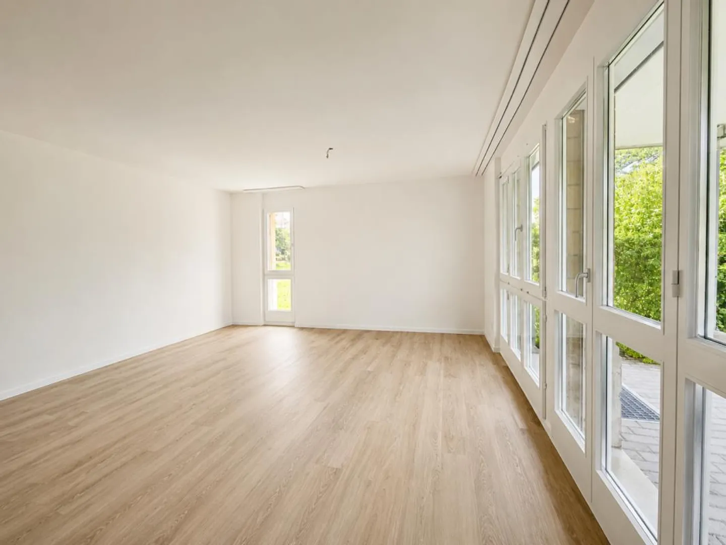 Appartamento giardino 4.5 stanze soleggiato in una zona residenziale tranquilla - Foto 5 di 11