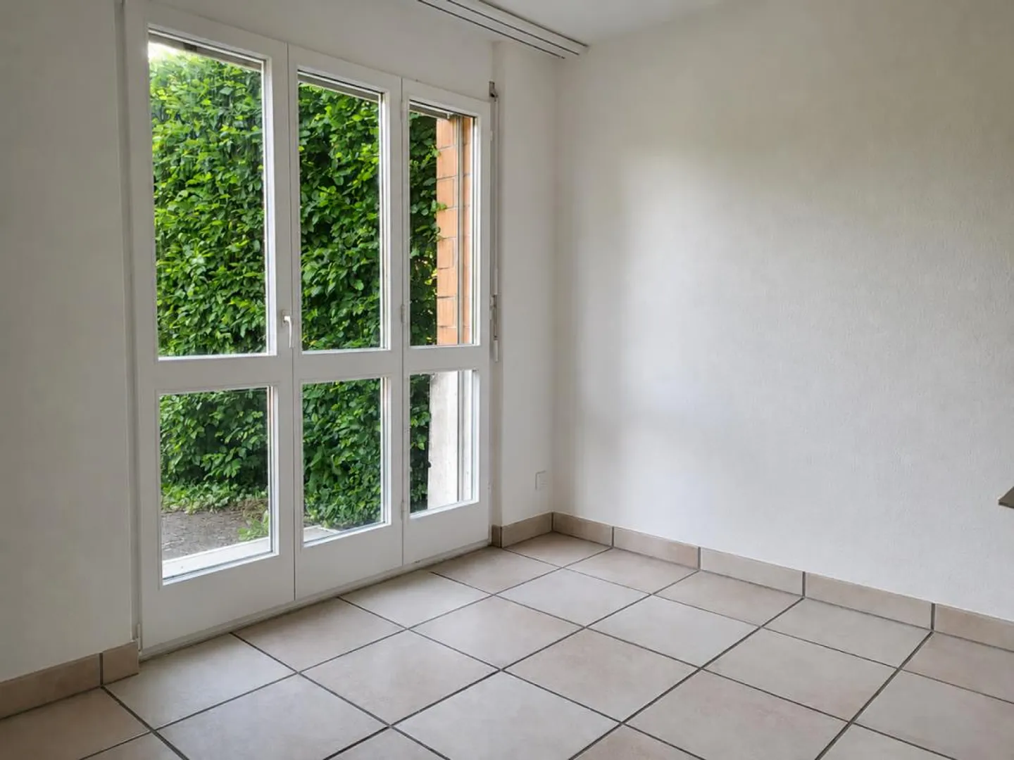 Appartamento giardino 4.5 stanze soleggiato in una zona residenziale tranquilla - Foto 6 di 11