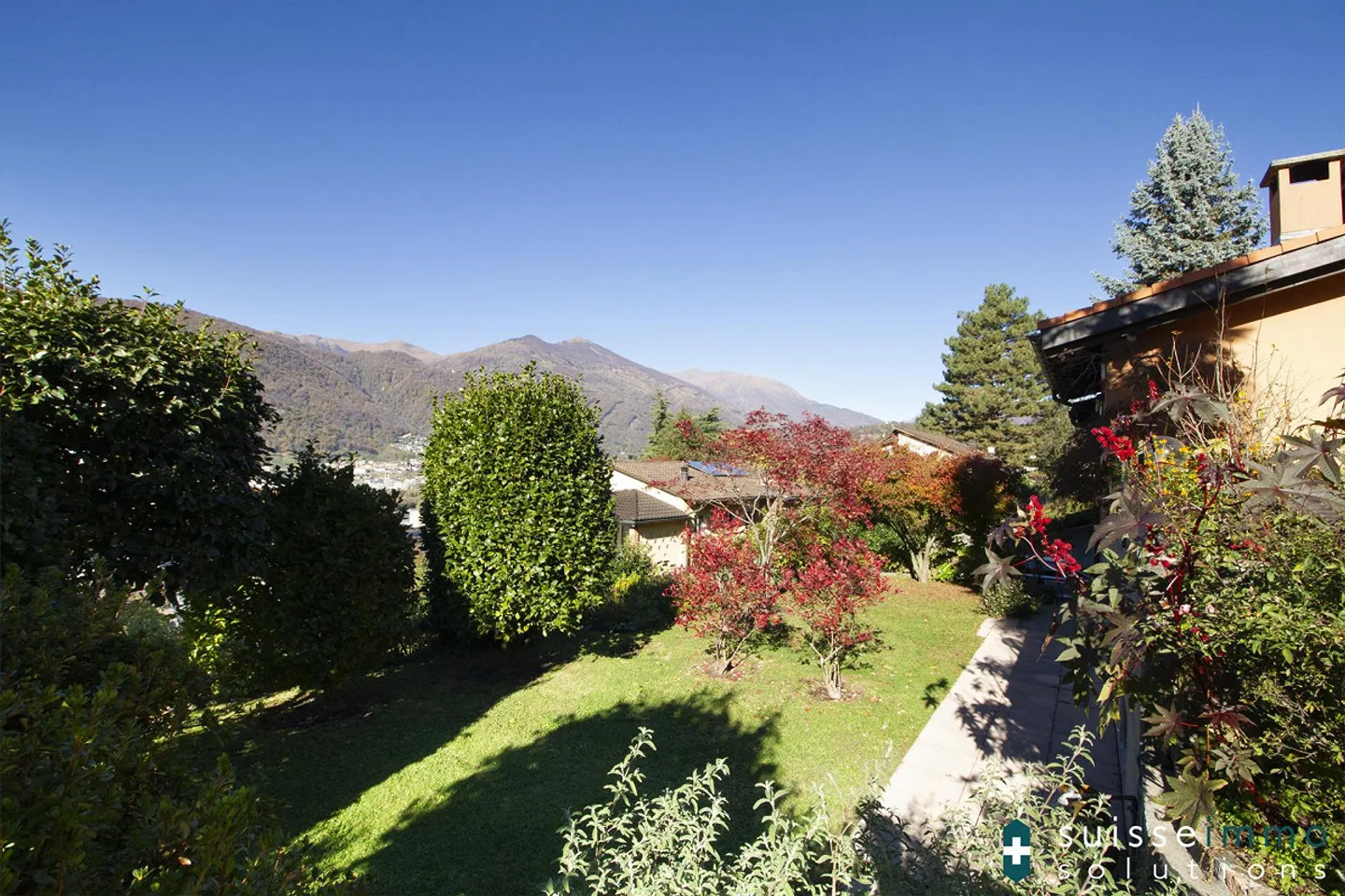 Vezia, Komfortable Doppelhaushälfte mit Garten - Foto 1 von 15