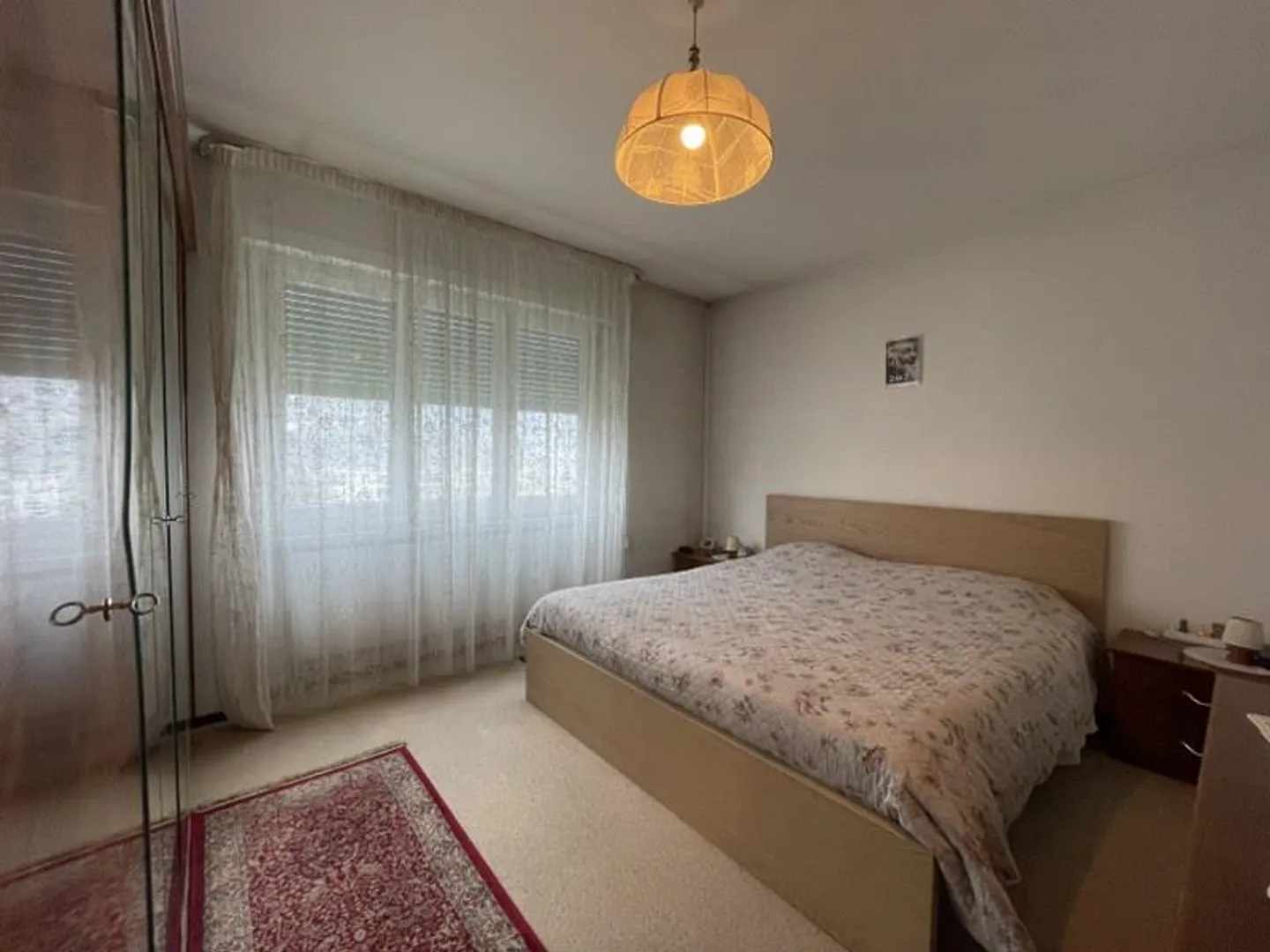 DUPLEX LUMINEUX DE 4,5 PIÈCES AVEC BALCONS ET VUE DÉGAGÉE SUR LES COLLINES ENVIRONNANTES. - Photo 11 sur 13