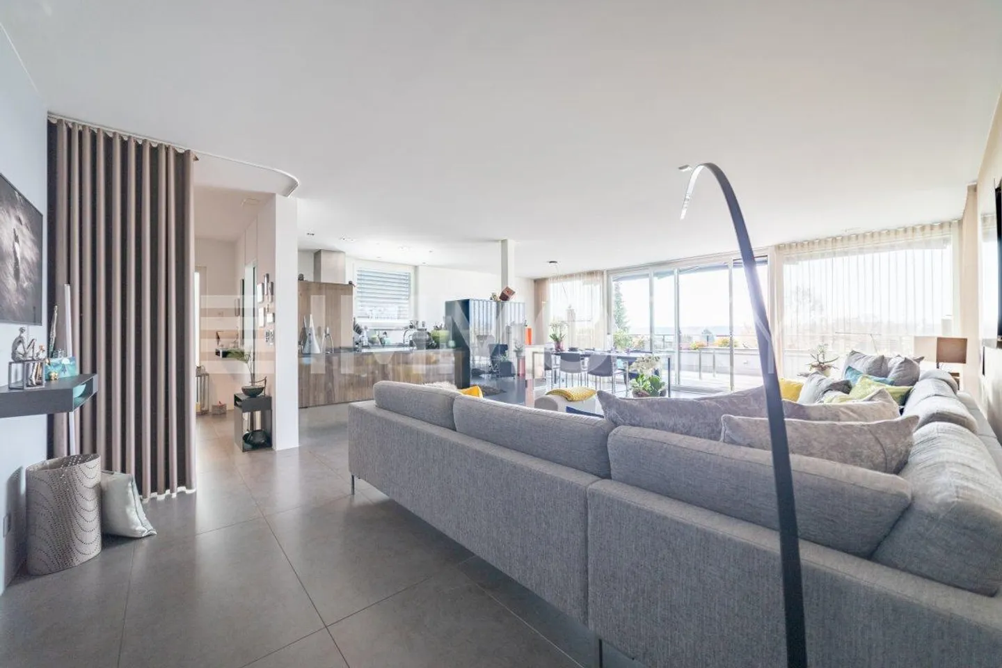 Exclusive Terrace Apartment in Gampelen - Photo 2 of 5