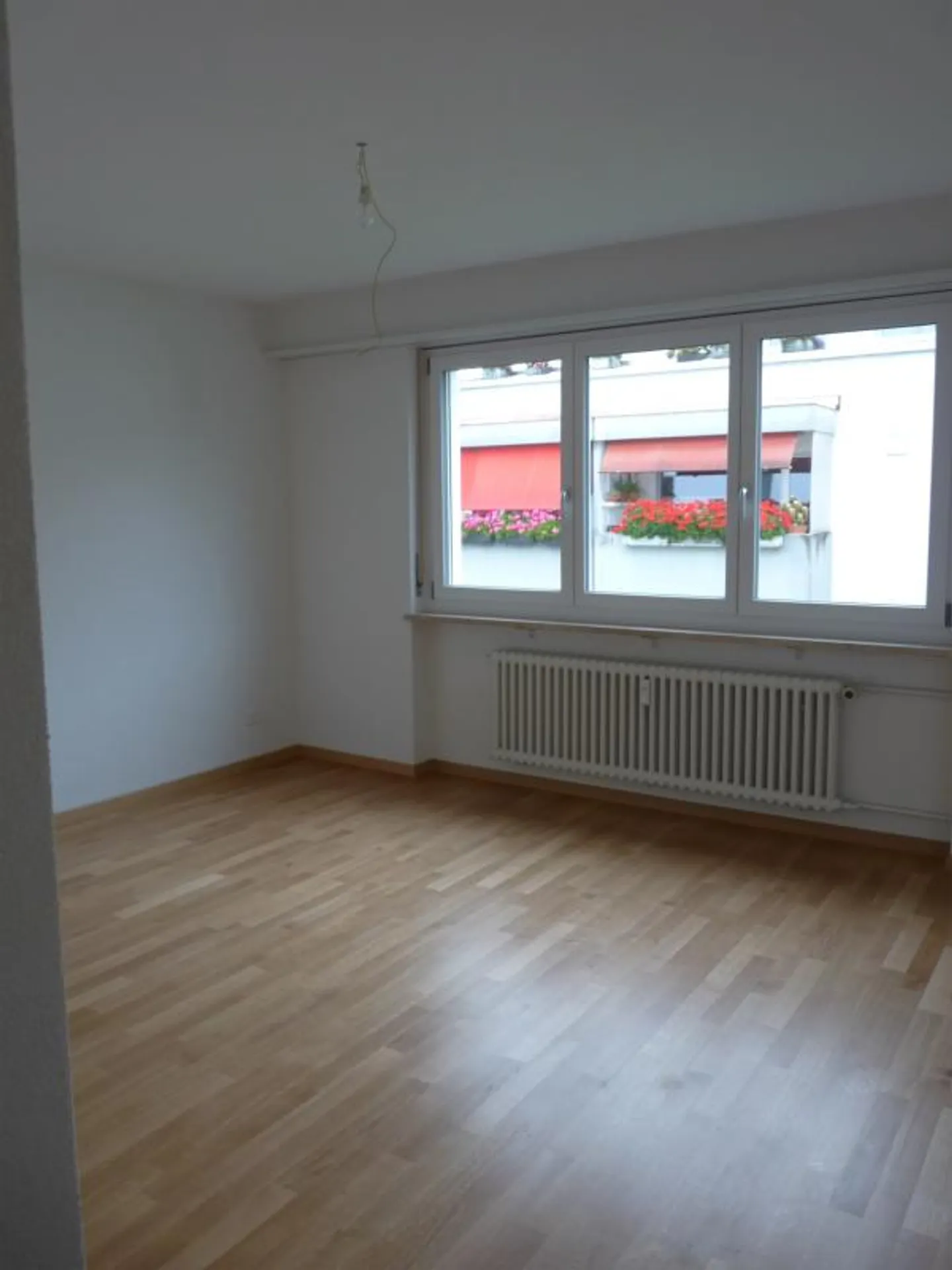 Appartement 4 pièces dans le vert et directement à côté de l'école - Photo 2 sur 12