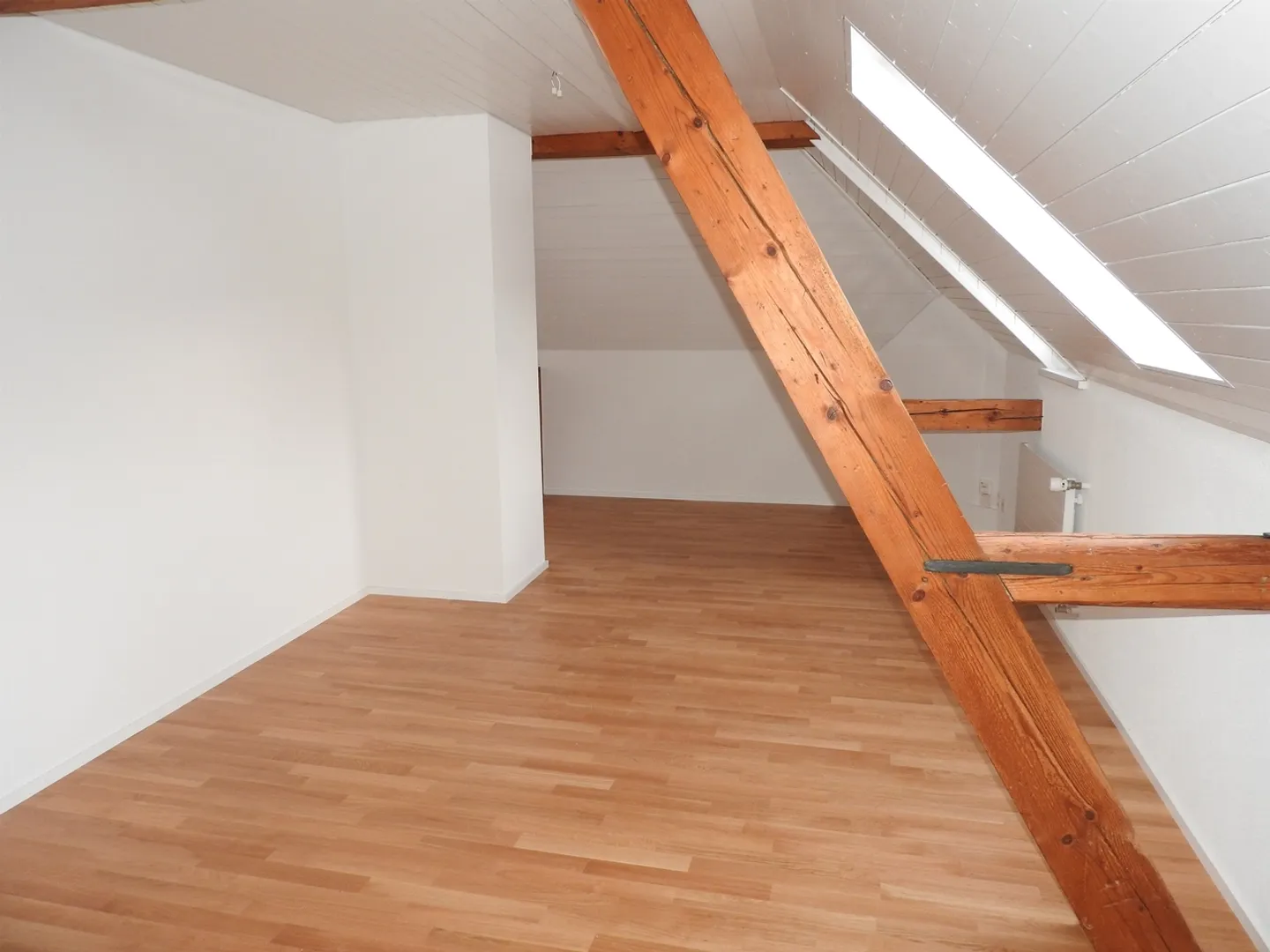Charmante Dachwohnung - Foto 5 von 6
