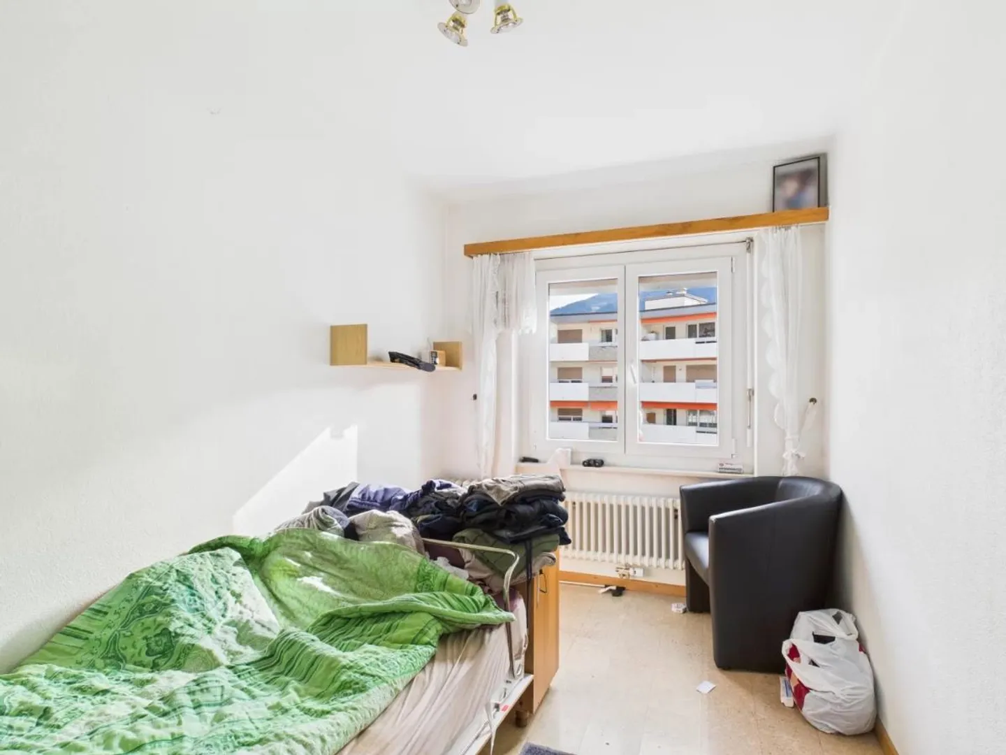 Condominium central au 6ème étage avec potentiel locatif à Naters - Photo 6 sur 10