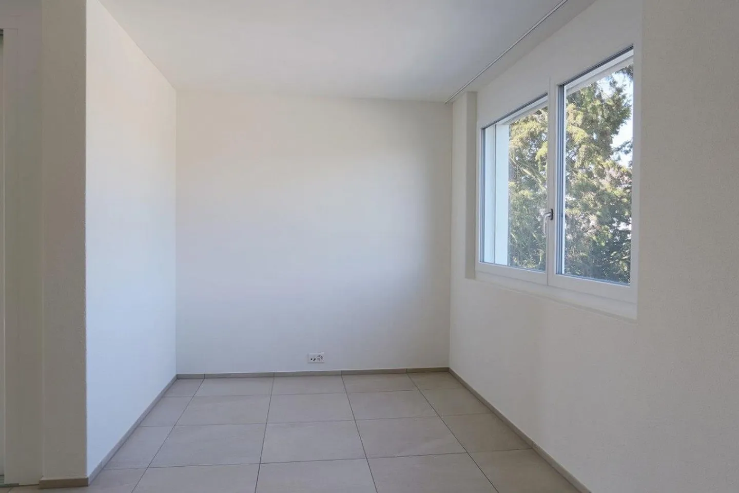 appartement de ville lumineux de 3,5 pièces - Photo 4 sur 13
