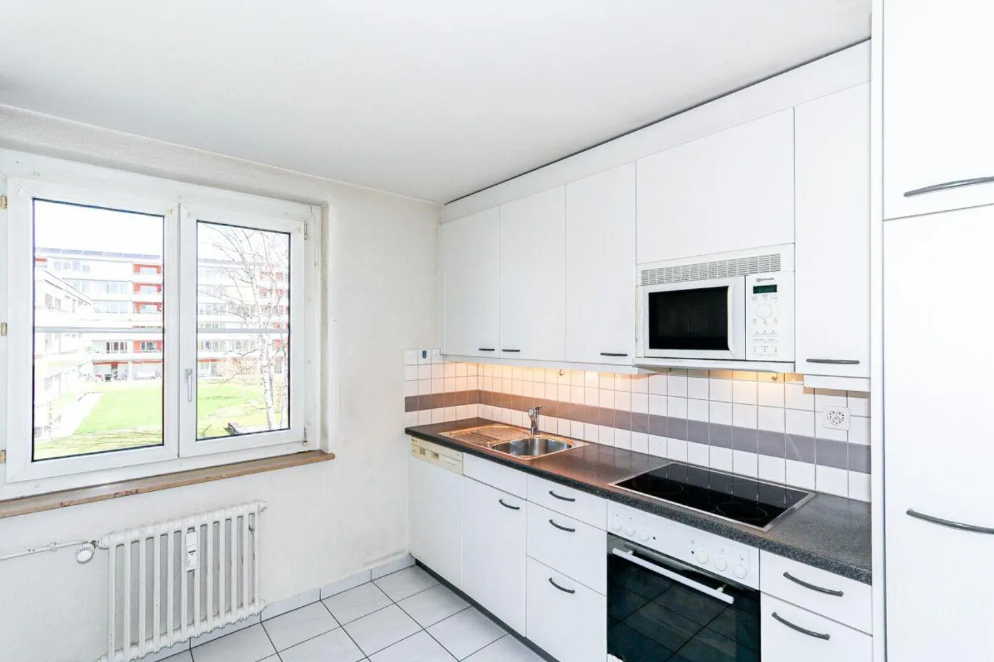 Charmante appartement 3 pièces avec place de parking près du parc St. Jakob - Photo 6 sur 11