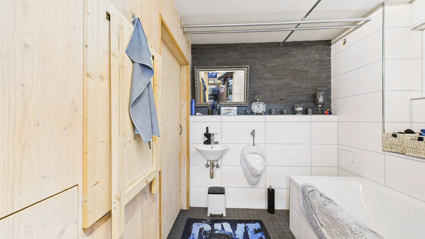 Charmantes Einfamilienhaus mit grossem Garten und vielseitig nutzbarer Einliegerwohnung - Foto 14 von 21