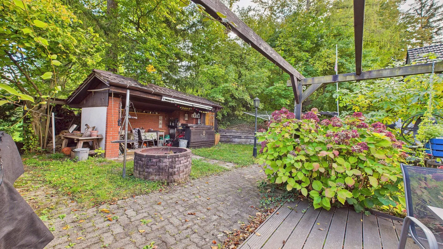 Charmantes Einfamilienhaus mit grossem Garten und vielseitig nutzbarer Einliegerwohnung - Foto 17 von 21