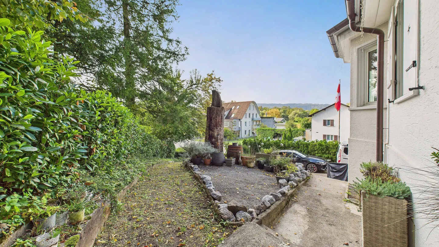 Charmantes Einfamilienhaus mit grossem Garten und vielseitig nutzbarer Einliegerwohnung - Foto 18 von 21