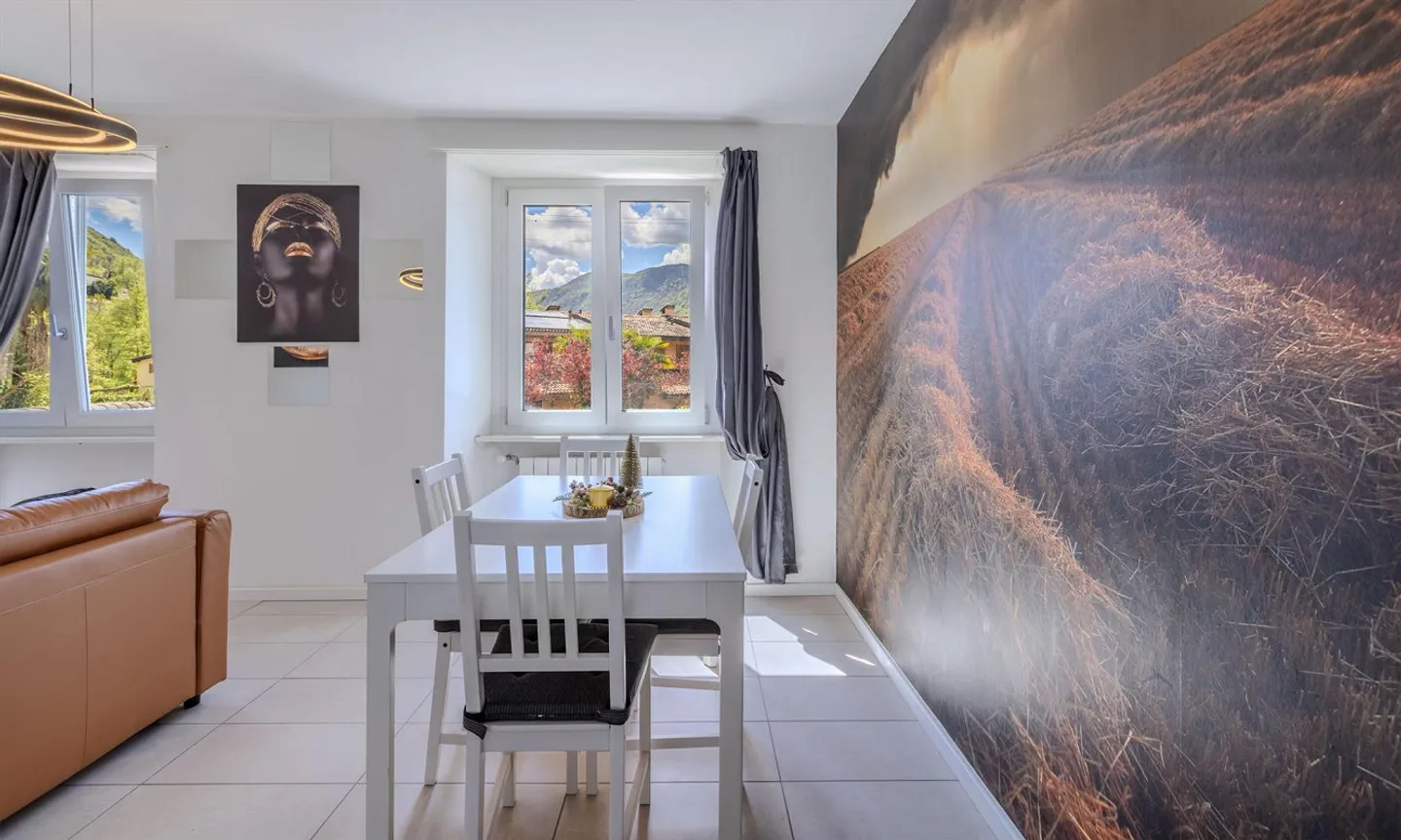 OTTIMO AFFARE - GRANDE APPARTAMENTO 3.5 STANZE CON BALCONE A LUGANO FIGINO - Foto 2 di 9