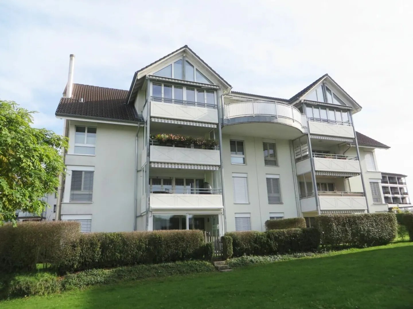 Incantevole appartamento mansardato di 2,5 stanze con giardino d'inverno - Foto 1 di 12