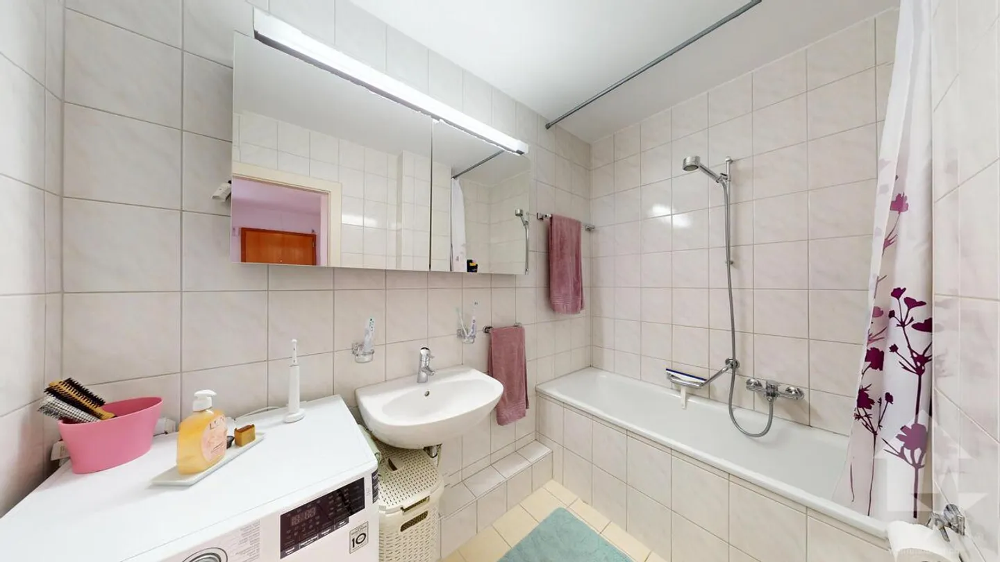 Joli appartement de 3.5 pièces avec 2 places de parc - Photo 7 sur 15