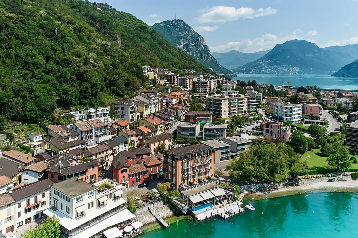 Casa plurifamiliare con tre appartamenti a Melide - Foto 1 von 11