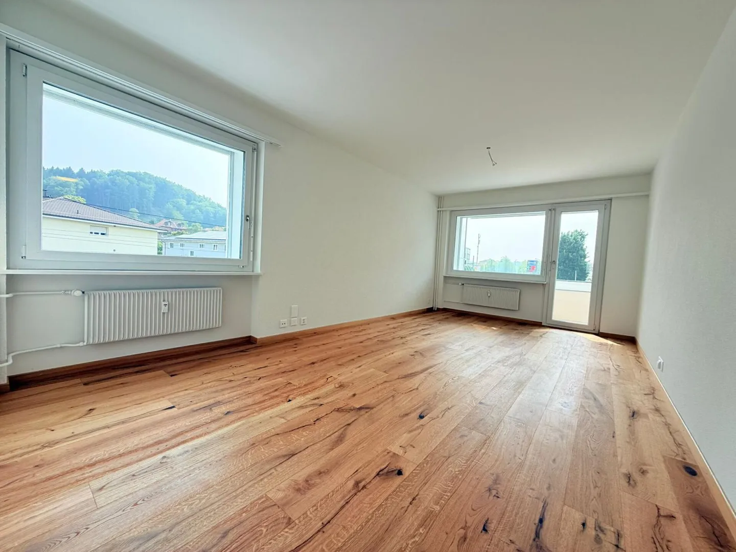 Sanierte 3.5 Zimmer Wohnung an urbaner Lage - Foto 2 von 8