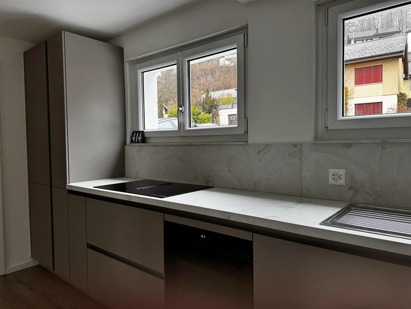 Une maison familiale double de 5,5 pièces récemment rénovée - Photo 4 sur 19