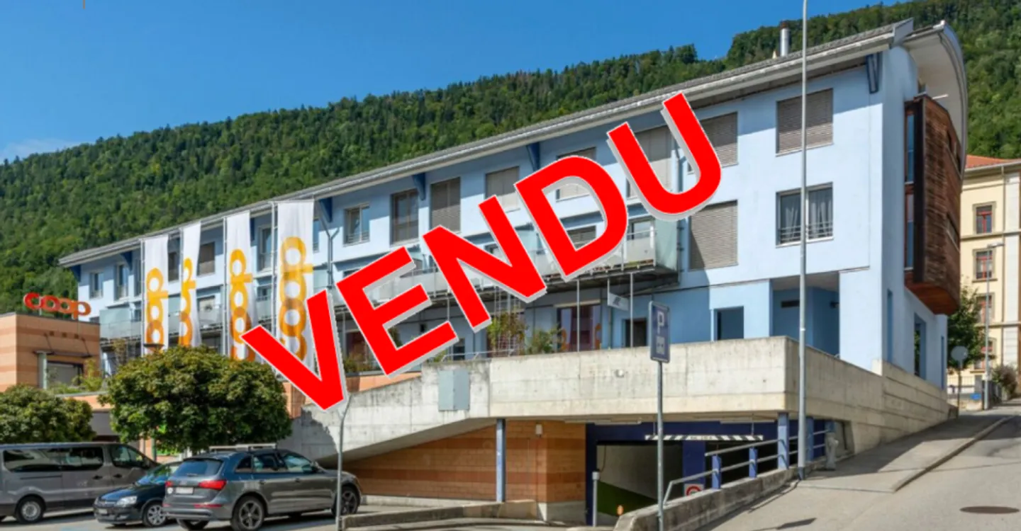 St-Imier, 4.5-room duplex with balcony and parking space - Photo 1 of 11