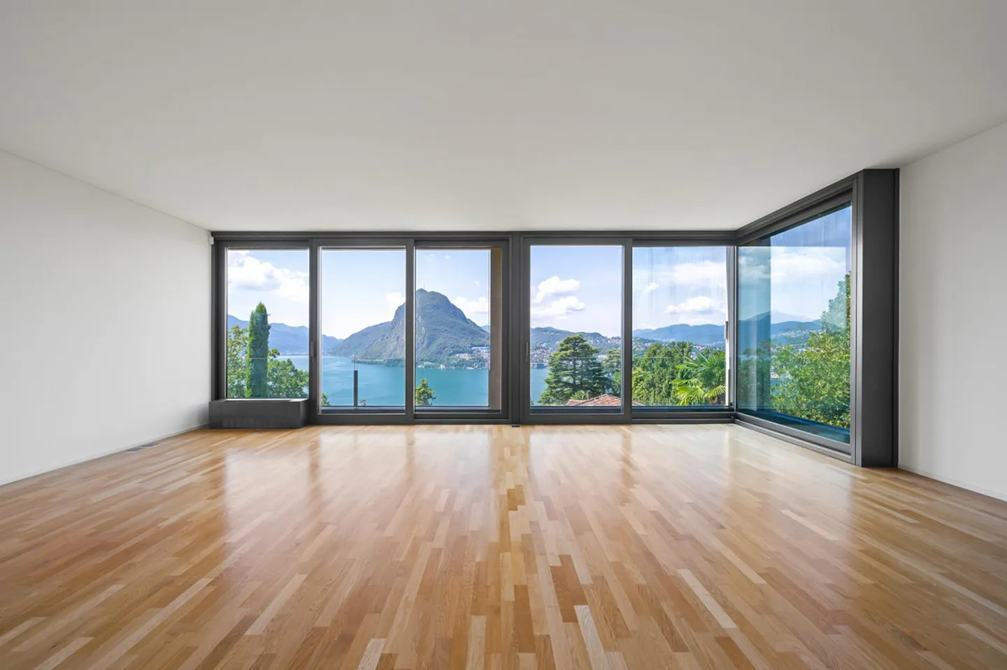 AGRÉABLE APPARTEMENT DE 4.5 PIÈCES AVEC VUE SUR LE LAC À RUVIGLIANA - Photo 3 sur 13