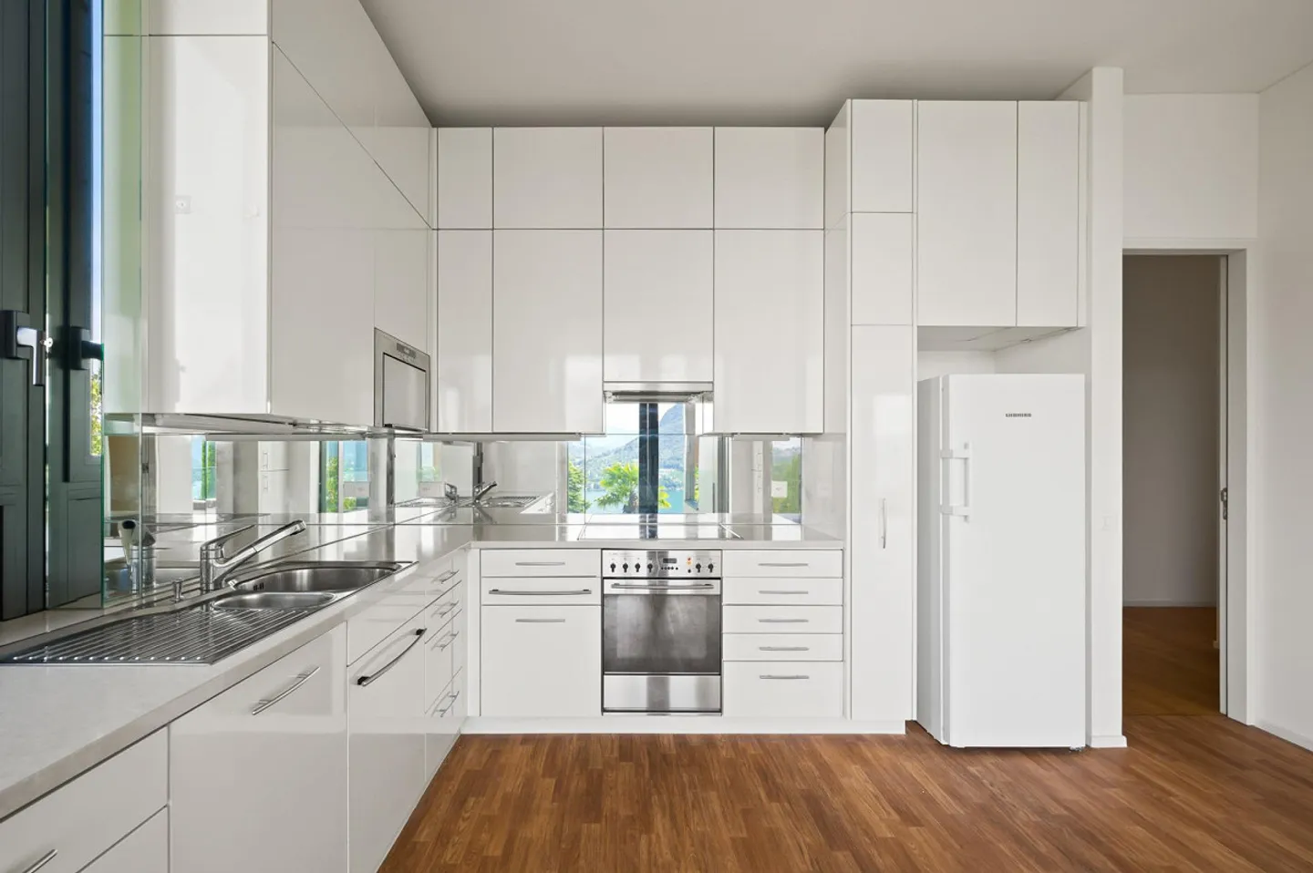 AGRÉABLE APPARTEMENT DE 4.5 PIÈCES AVEC VUE SUR LE LAC À RUVIGLIANA - Photo 5 sur 13