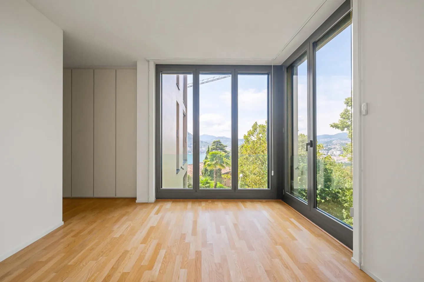 AGRÉABLE APPARTEMENT DE 4.5 PIÈCES AVEC VUE SUR LE LAC À RUVIGLIANA - Photo 8 sur 13