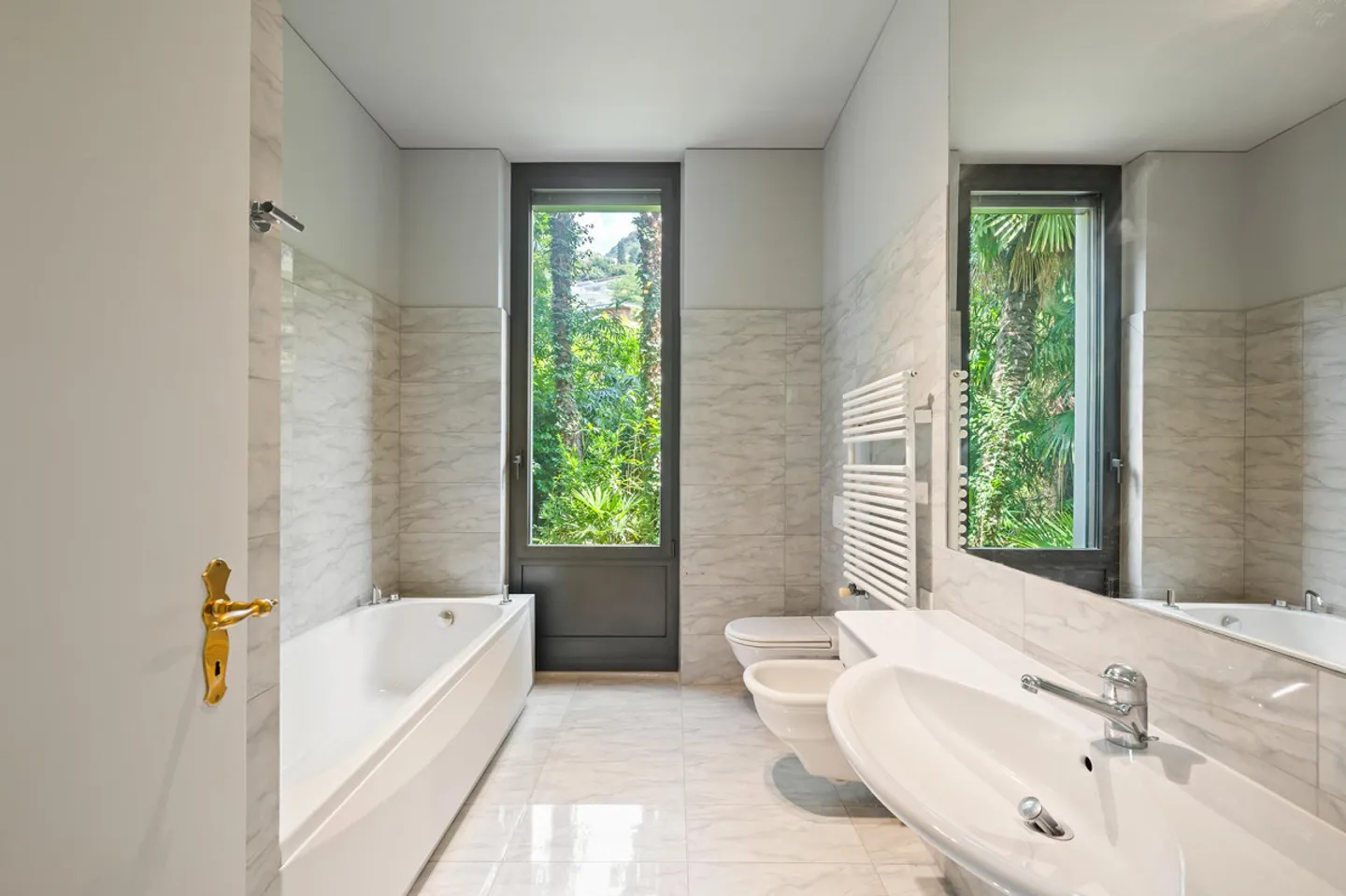 AGRÉABLE APPARTEMENT DE 4.5 PIÈCES AVEC VUE SUR LE LAC À RUVIGLIANA - Photo 12 sur 13