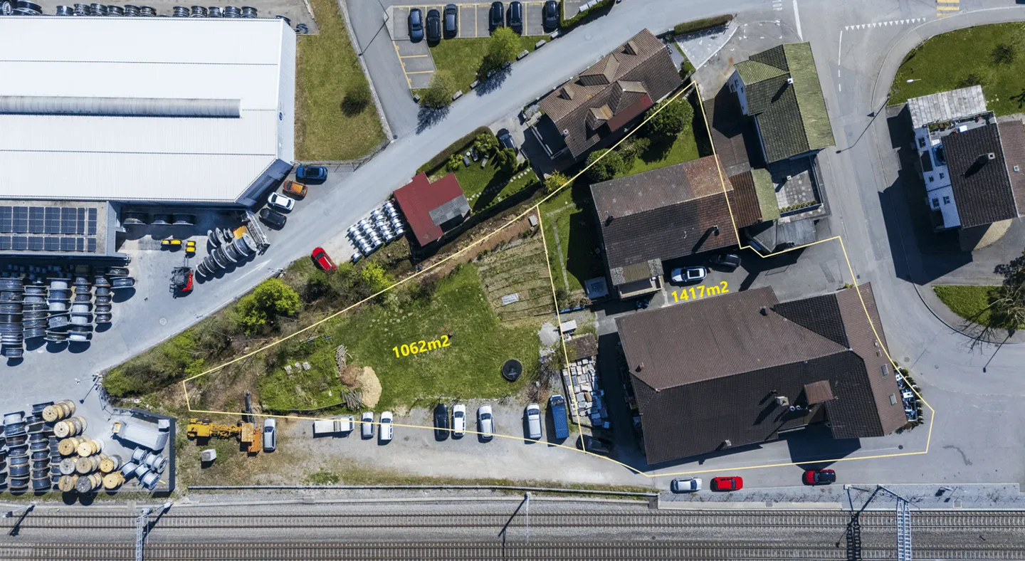 MULTI-FAMILY HOUSE + RESIDENTIAL - COMMERCIAL BUILDING WITH EXPANSION POTENTIAL + LAND RESERVE - Photo 1 of 3
