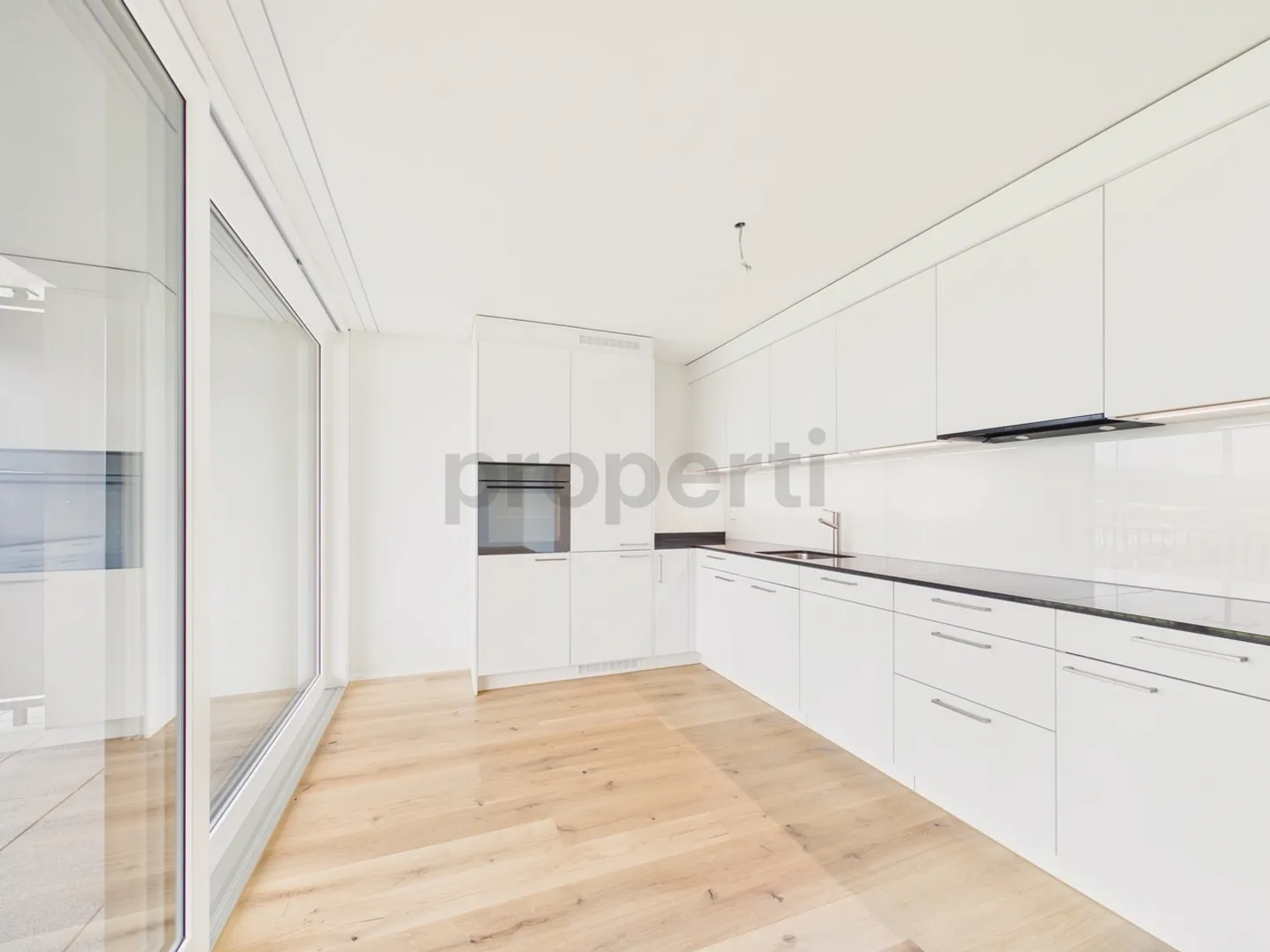Moderne 1.5-Zimmer-Wohnung mit Balkon - Foto 2 von 8