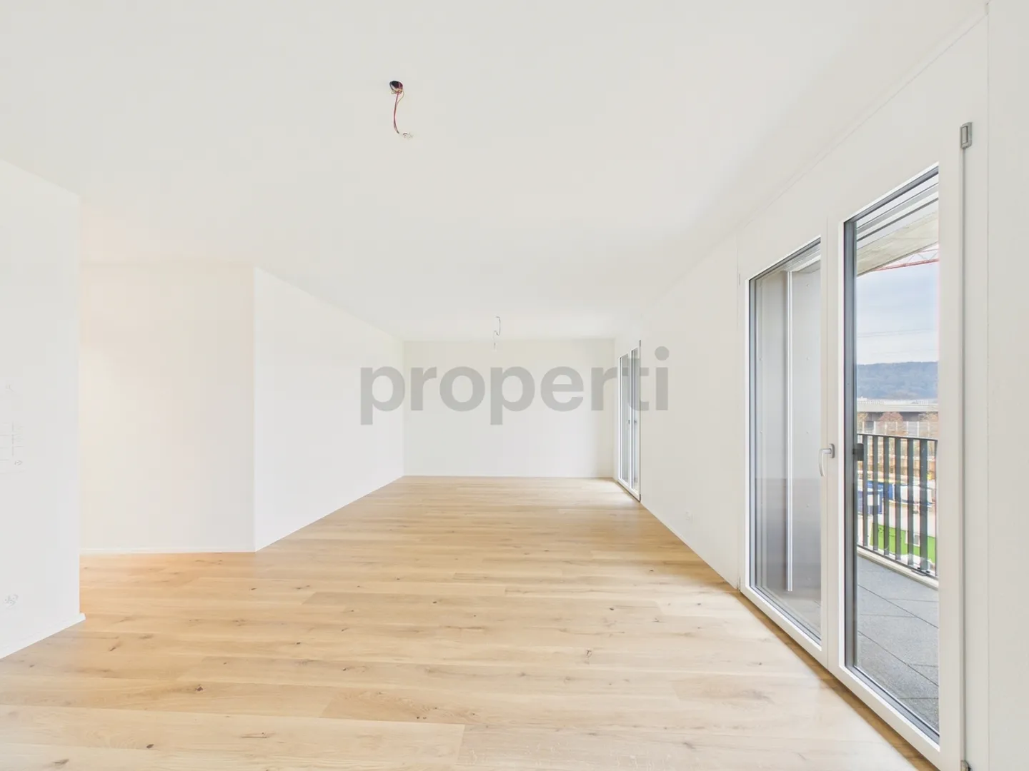 Moderne 1.5-Zimmer-Wohnung mit Balkon - Foto 4 von 8