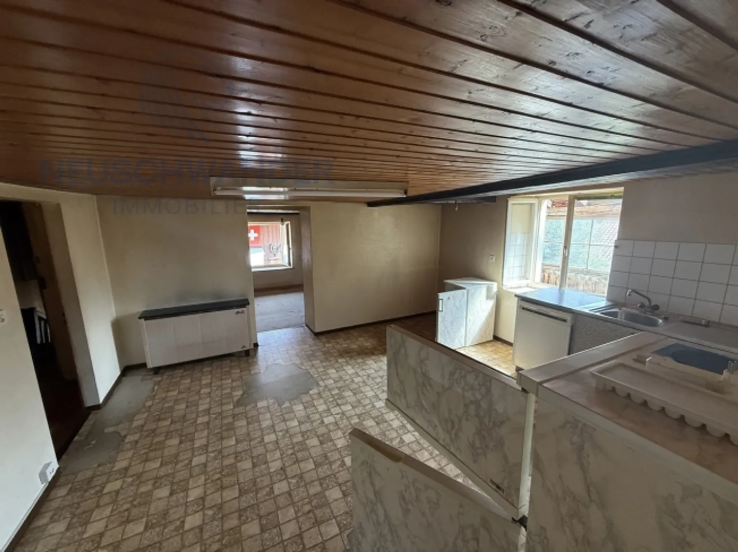 Alto potenziale per questa casa idealmente situata con 2 appartamenti - Foto 11 di 20