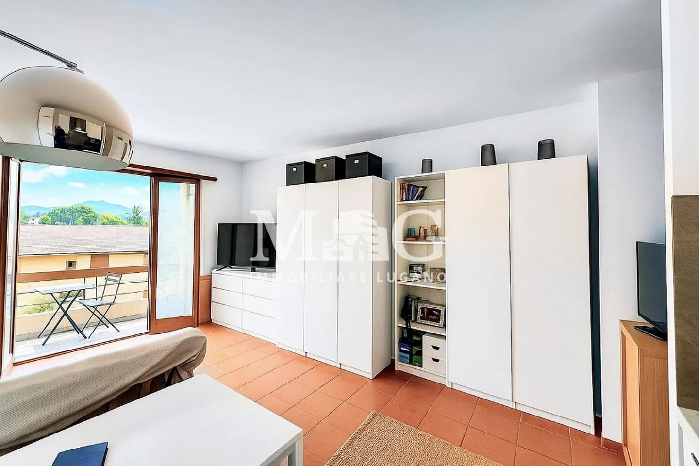 Caslano: Studio mit Kamin und Parkplatz - Foto 5 von 10