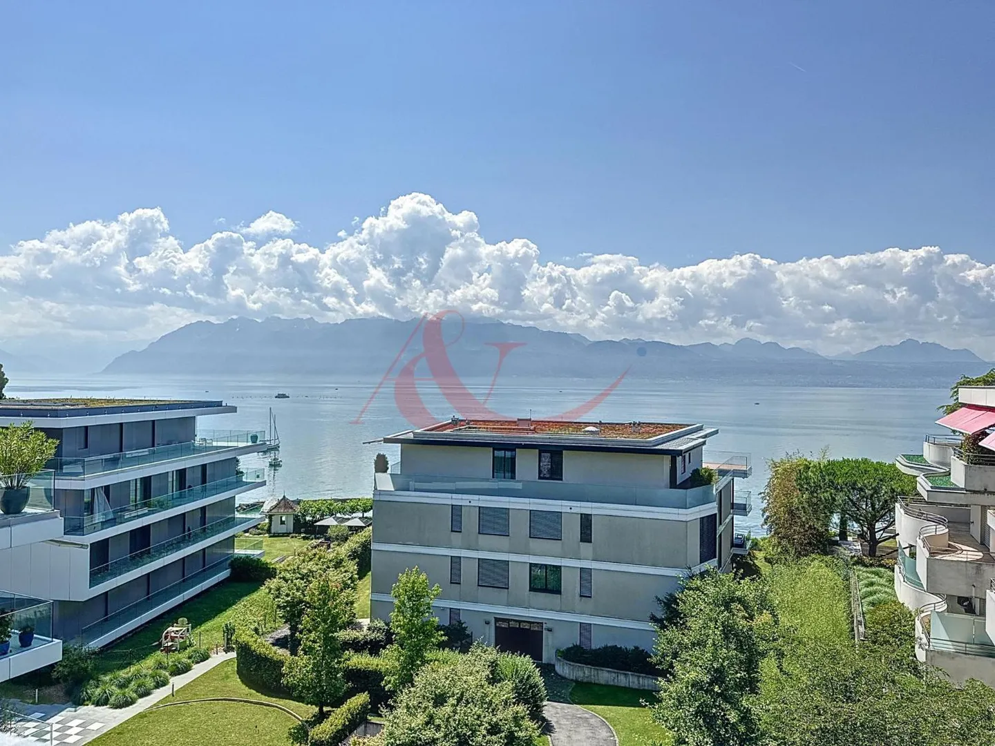 Propriété extraordinaire sur les rives du lac Léman avec vue panoramique - Photo 1 sur 12