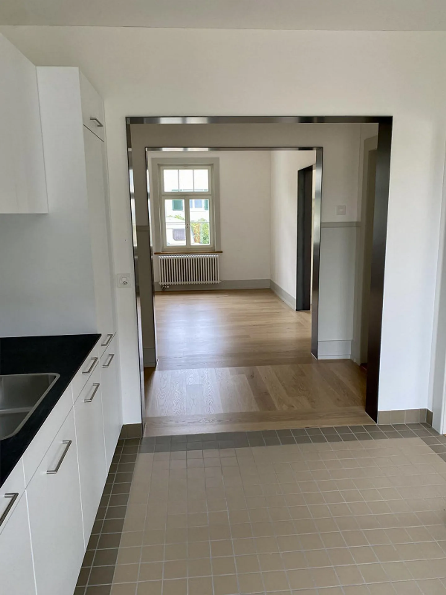 Appartement rénové de 3,5 pièces avec charme - Photo 5 sur 10