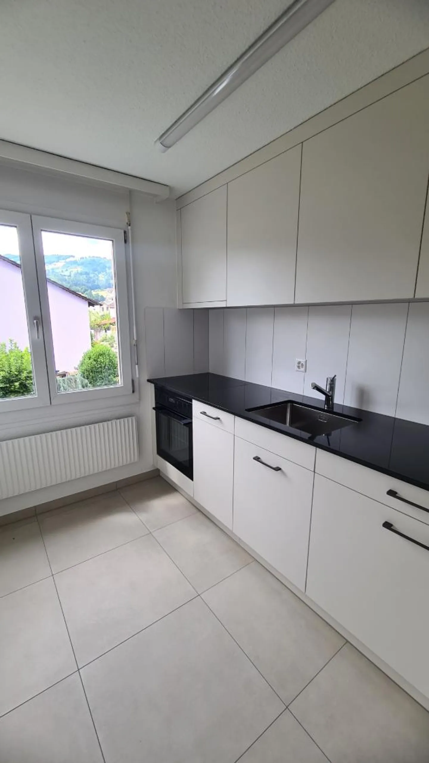 Appartement 2.5 pièces rénové - Photo 2 sur 6
