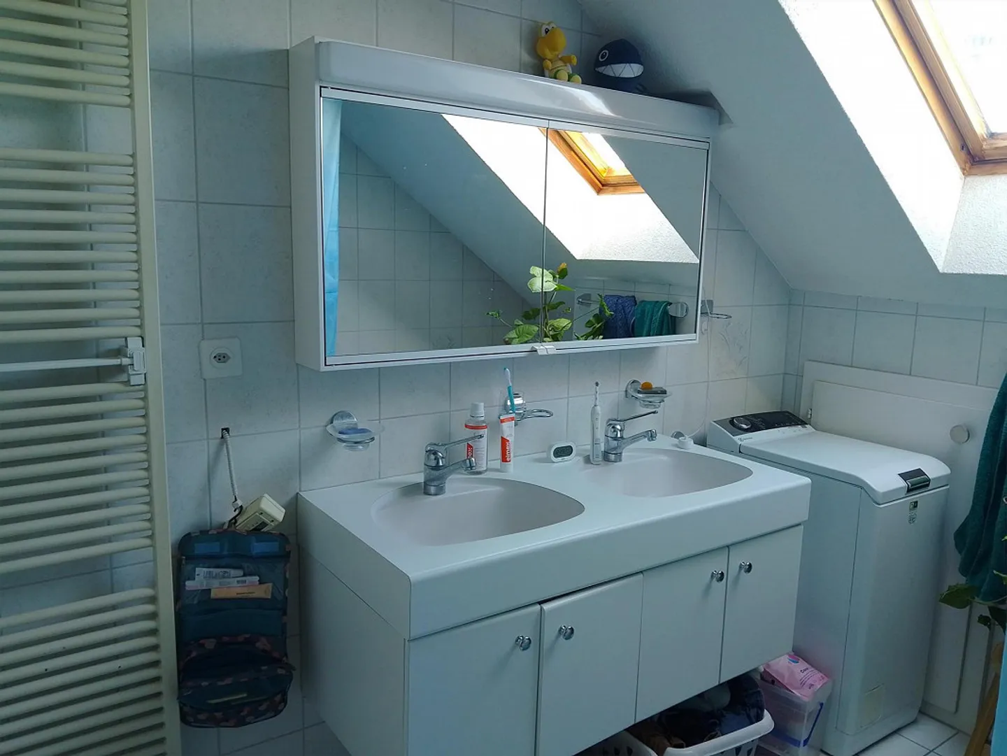 Charmante Dachwohnung mit Terrasse - Foto 15 von 17