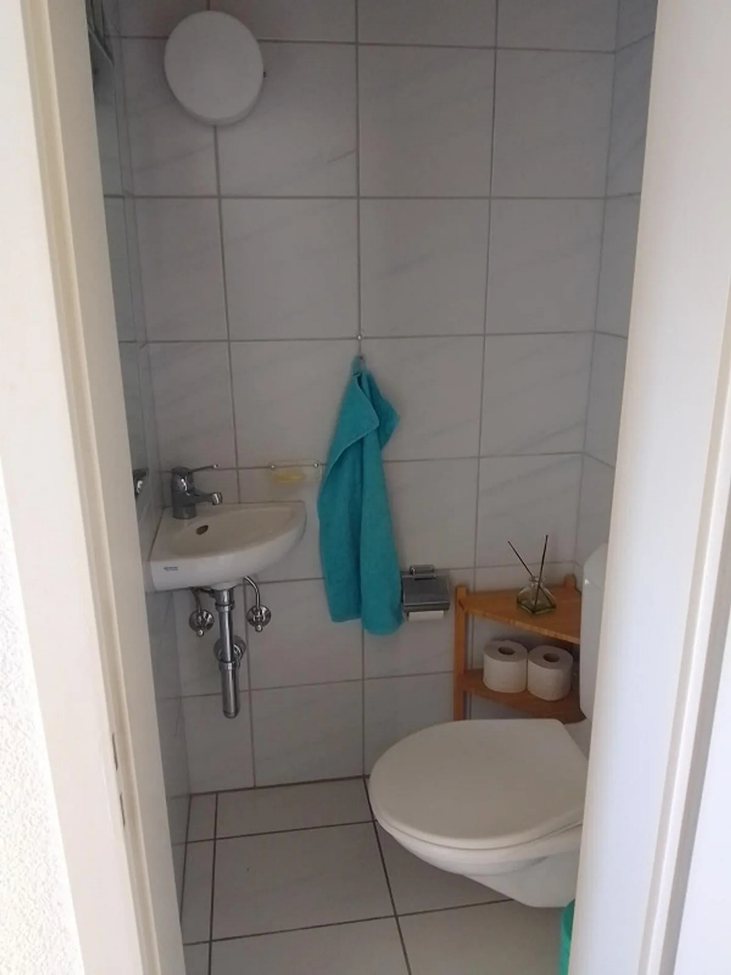 Charmante Dachwohnung mit Terrasse - Foto 16 von 17