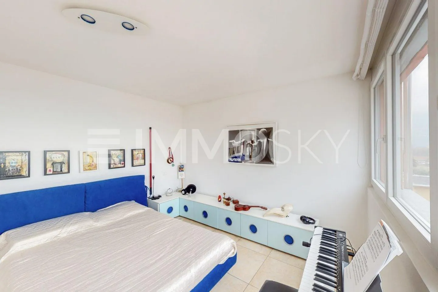 Geräumige Wohnung mit Terrasse - Foto 5 von 5