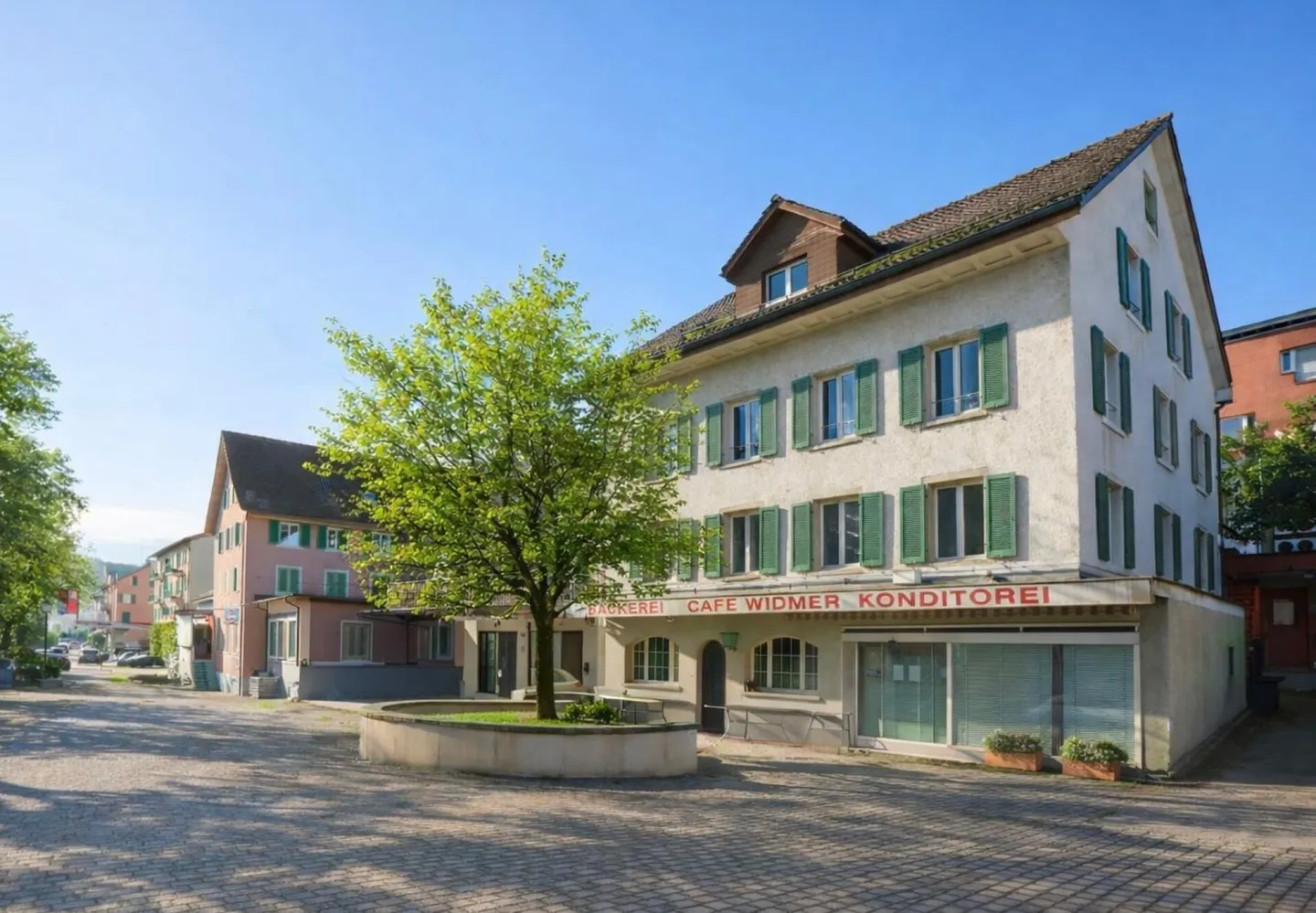 PLENTY OF SPACE IN A CENTRAL LOCATION: RESIDENTIAL AND COMMERCIAL BUILDING WITH POTENTIAL - Photo 1 of 2