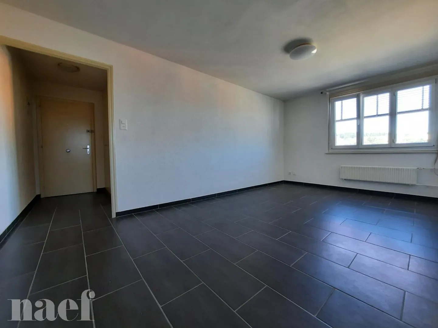 Bel appartement de 3 pièces au 3ème étage - Photo 3 sur 8